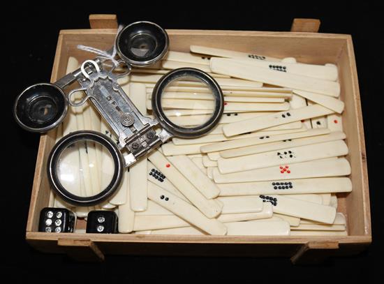A pair of Victorian silver skeleton opera glasses and a collection of mahjong sticks